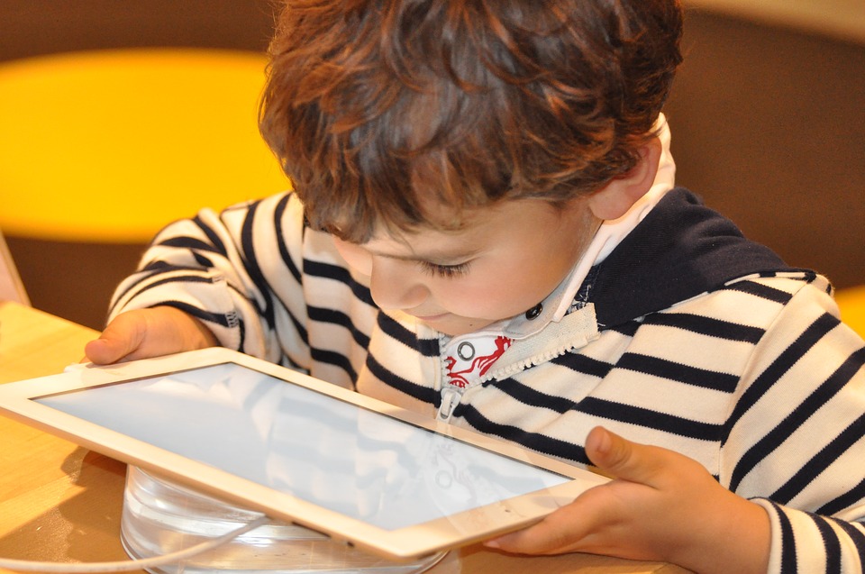 Toddler watching ipad screen
