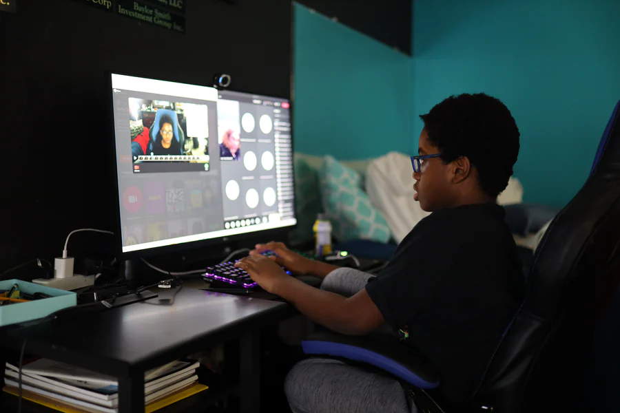 boy using computer