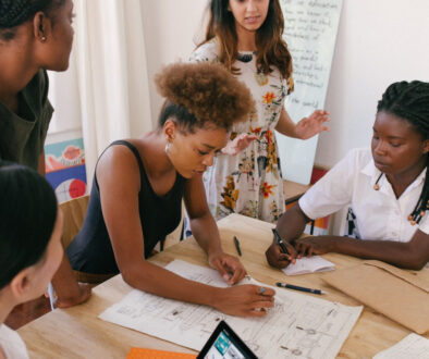 groupworkingarounddesk_featured groupworkingarounddesk_featured