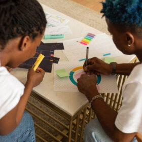 colourful notes discussion two students preparing learning notes