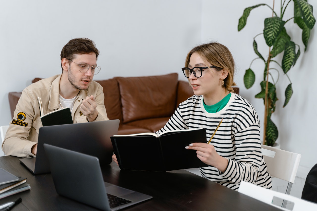 Two people discussing