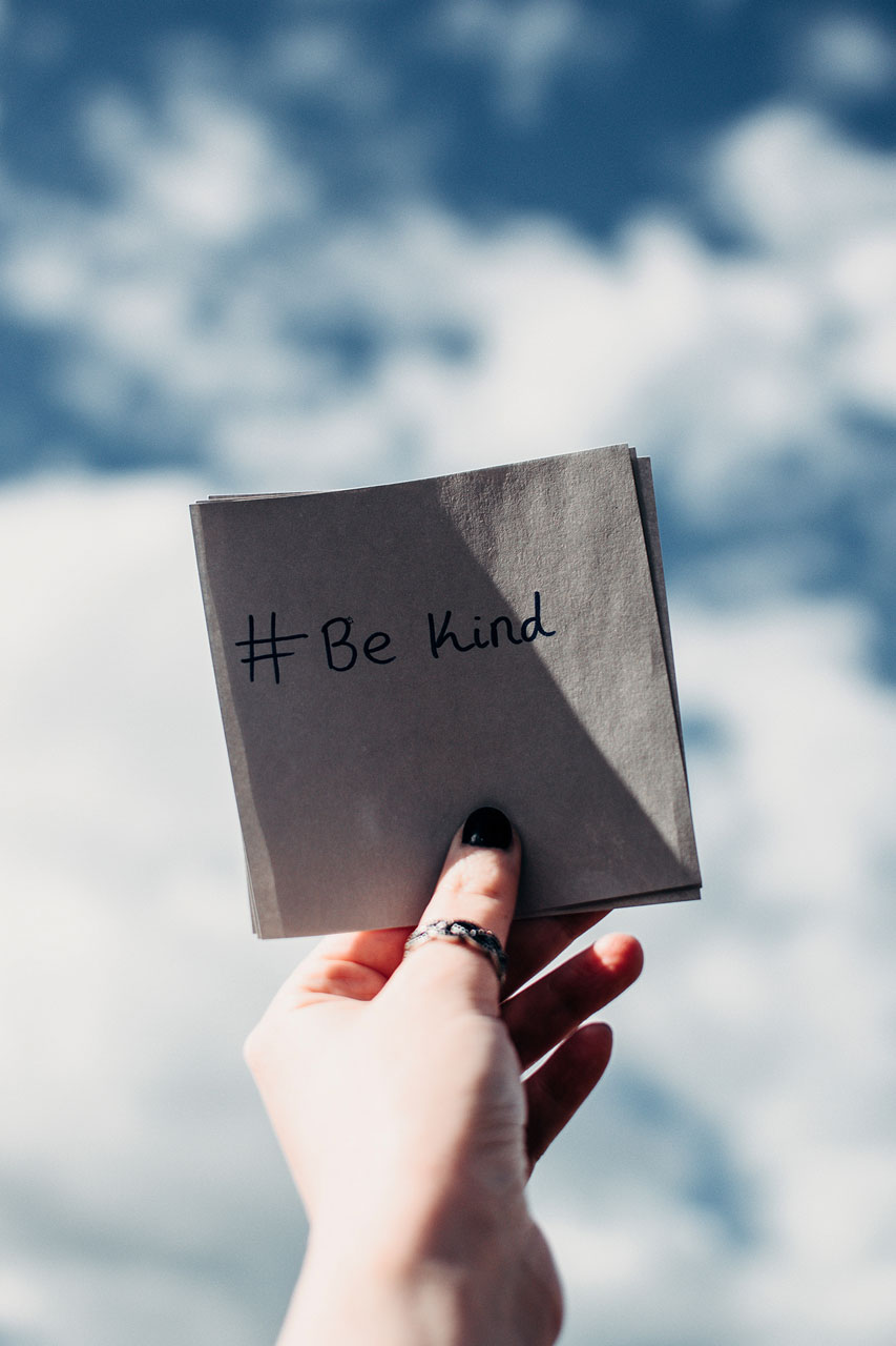 picture of a hand holding a written message #be kind