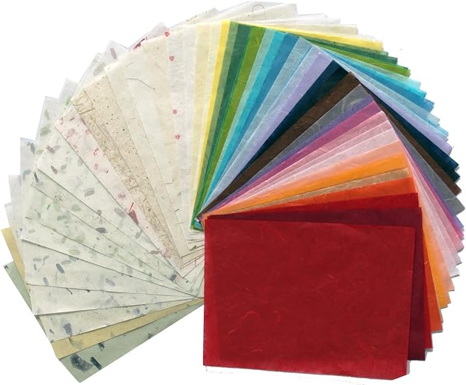 Textured Paper made by Mulberry, including colourful sheets and recycled paper with flower petals and leaves 
